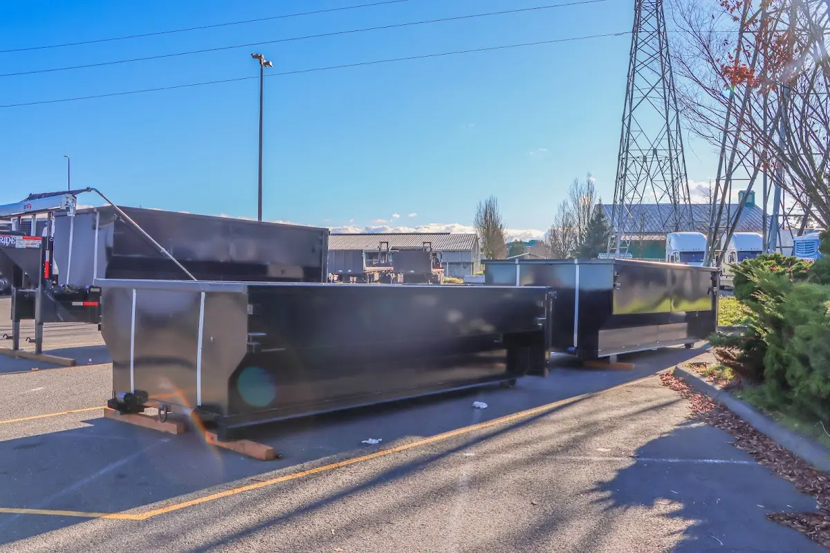 Roll-off dumpster ready for waste disposal at job site for 2 Yard Dumpster Rental in Wytheville